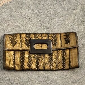 R&Y Augousti Gold/Bronze Clutch with Black Feather Accents